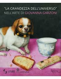 Front cover of the catalog "The Immensity of the Universe in the Art of Giovanna Garzoni," featuring a painting of a small dog on a pink tablecloth. The show is on at the Uffizi Galleries until June 29, 2020.